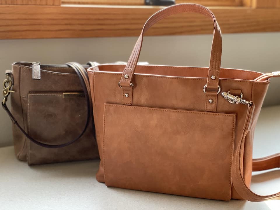Two GTM leather concealed carry bags