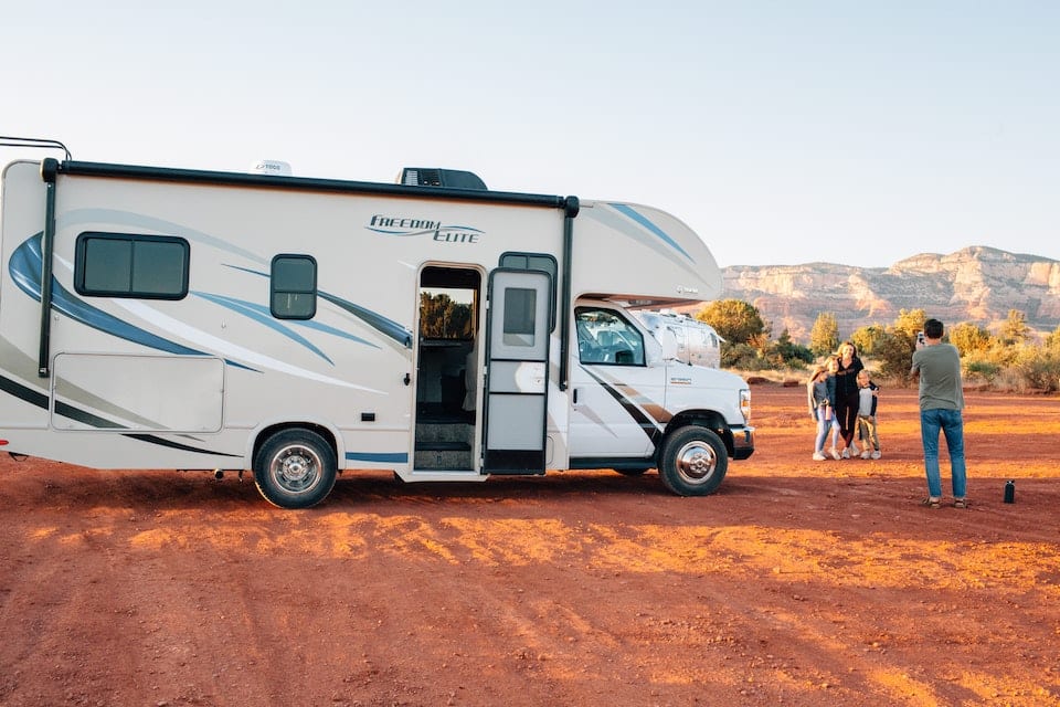 Family with RV (unsplash photo) Traveling by POV