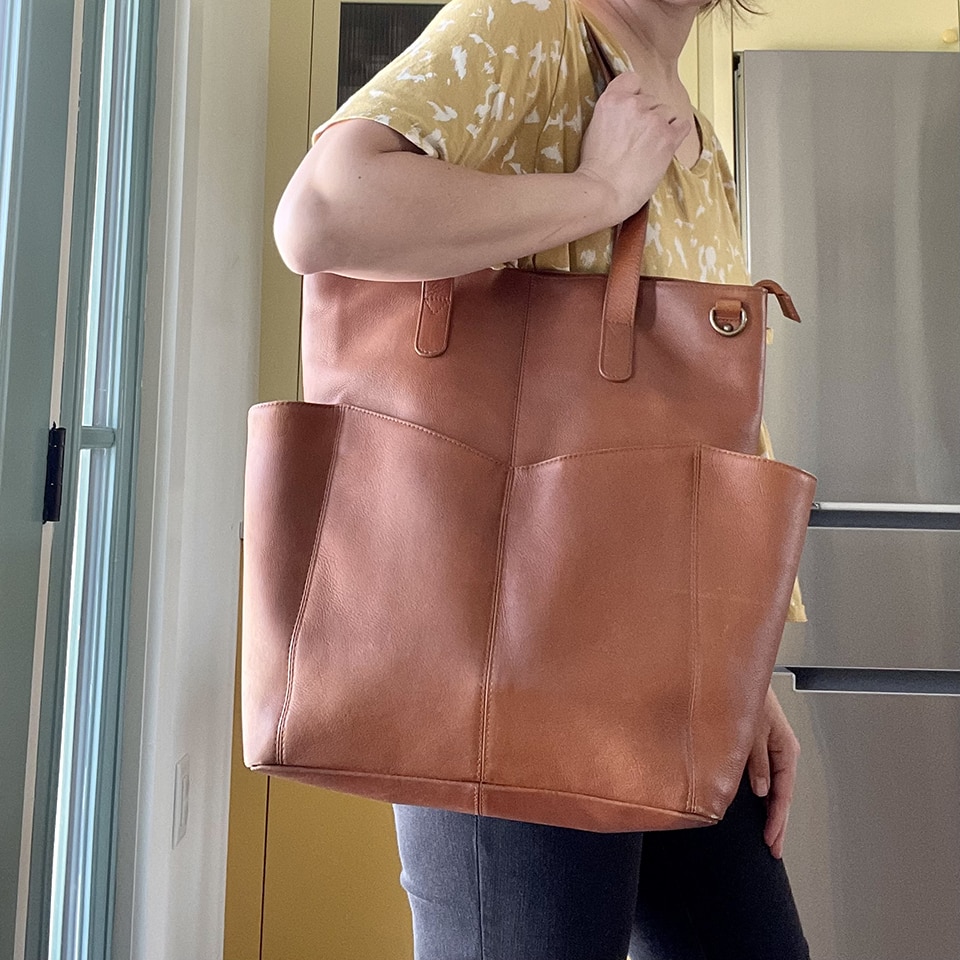 GTM 107 tan being worn purse dump