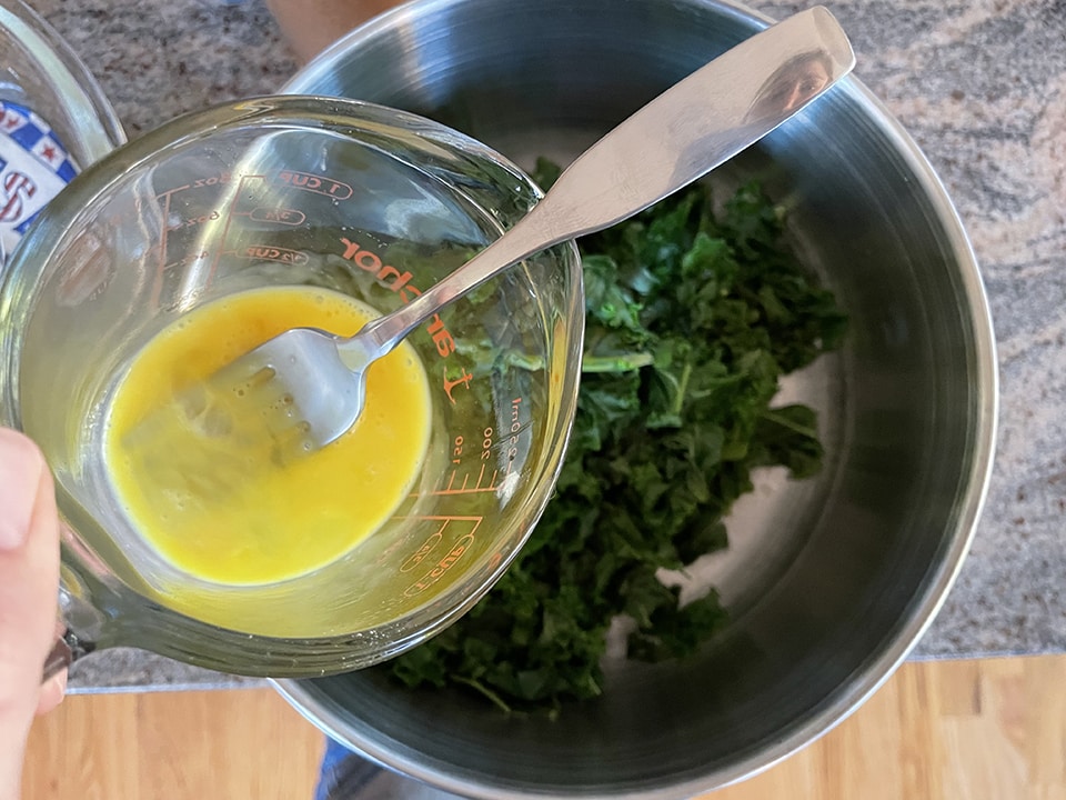 Kale Madeleine adding the eggs