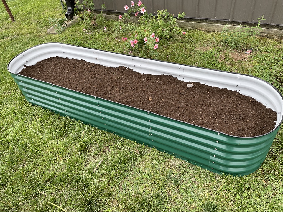 Raised Garden Bed Adding the Compost