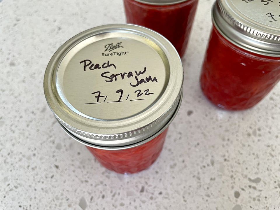 Bread Maker peach strawberry jam labeling the jar