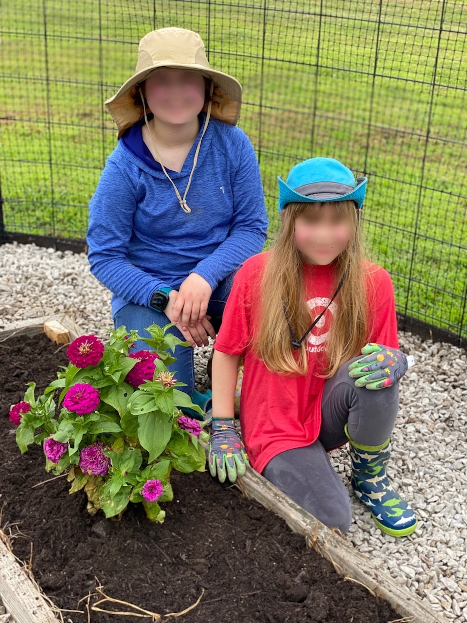 Anna & Rose pose with their new raised bed