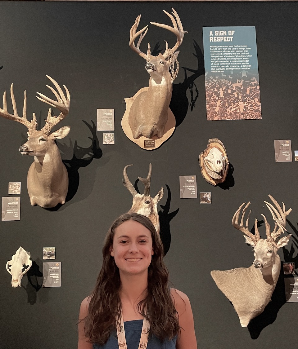 Ryleigh Campbell with deer above head