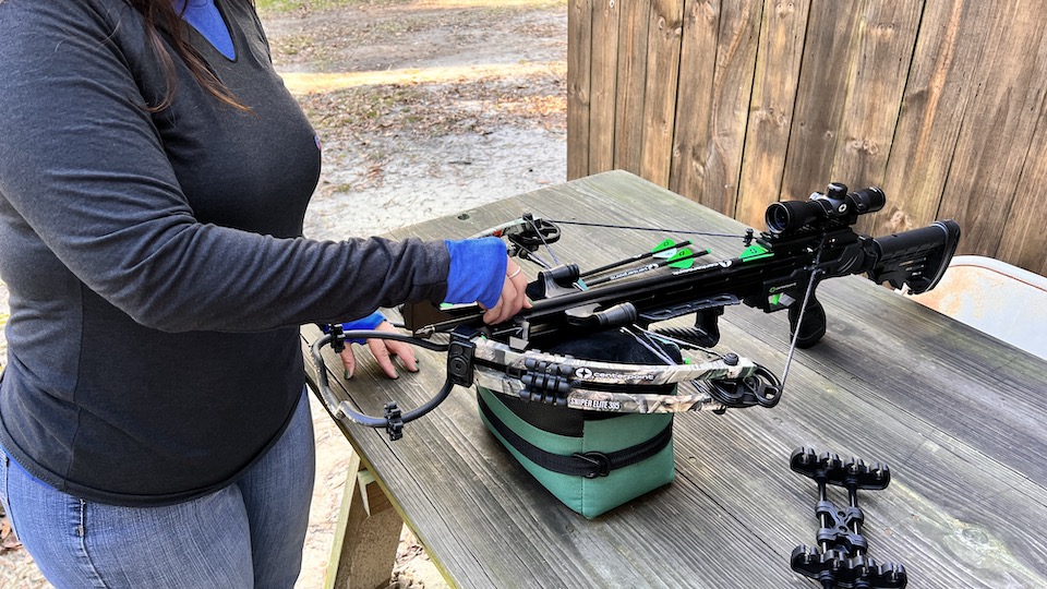 Angie Perry Loading the Next CenterPoint crossbow Arrow
