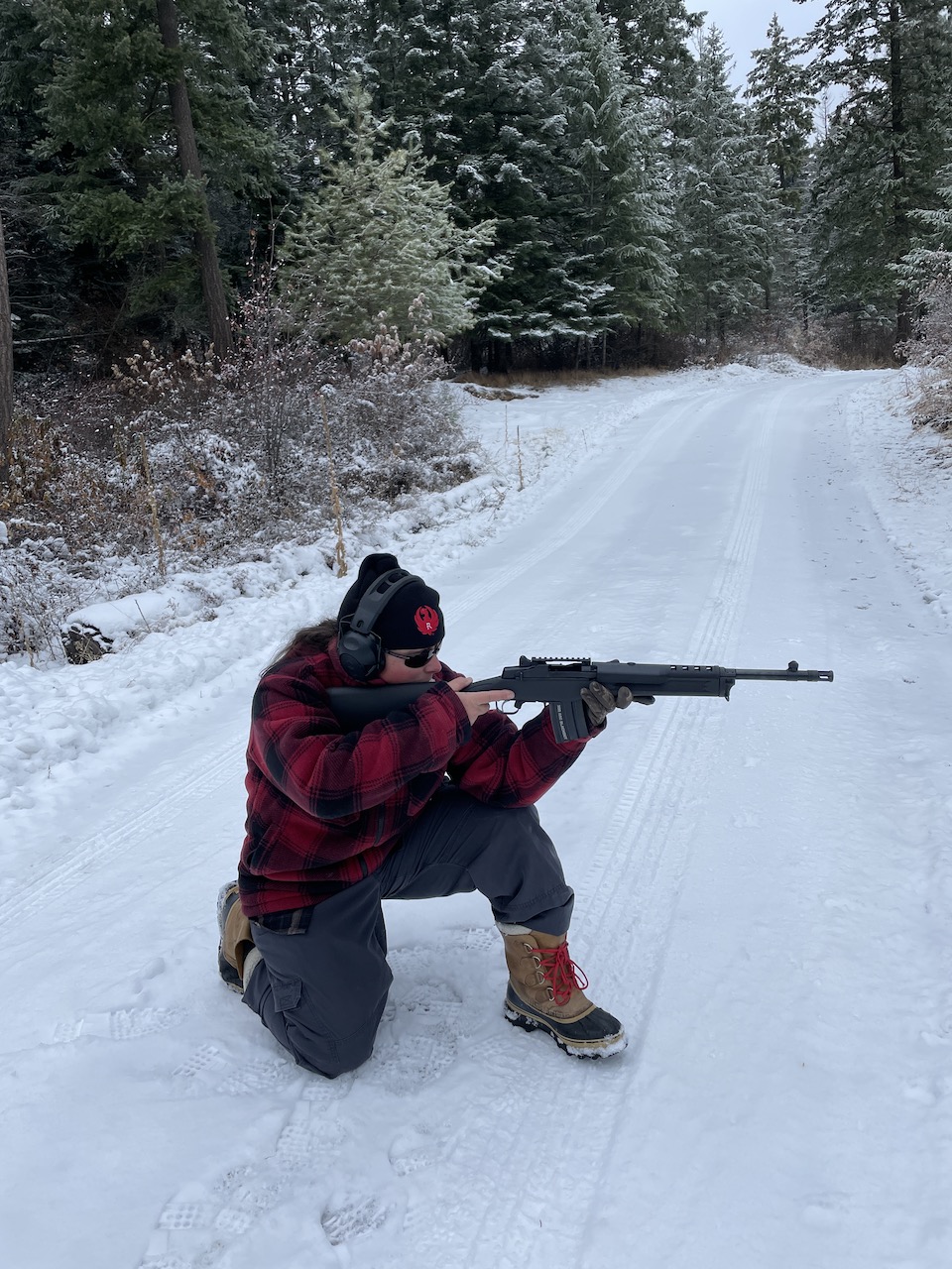 Jen in the woods with Mini-14