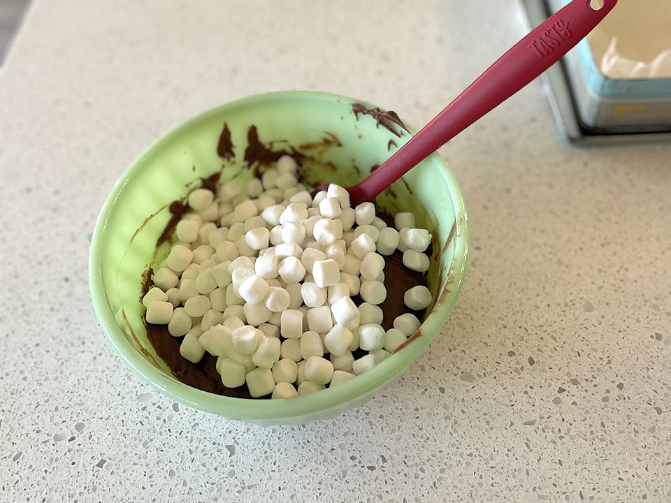 Rocky Road Fudge adding the marshmallows