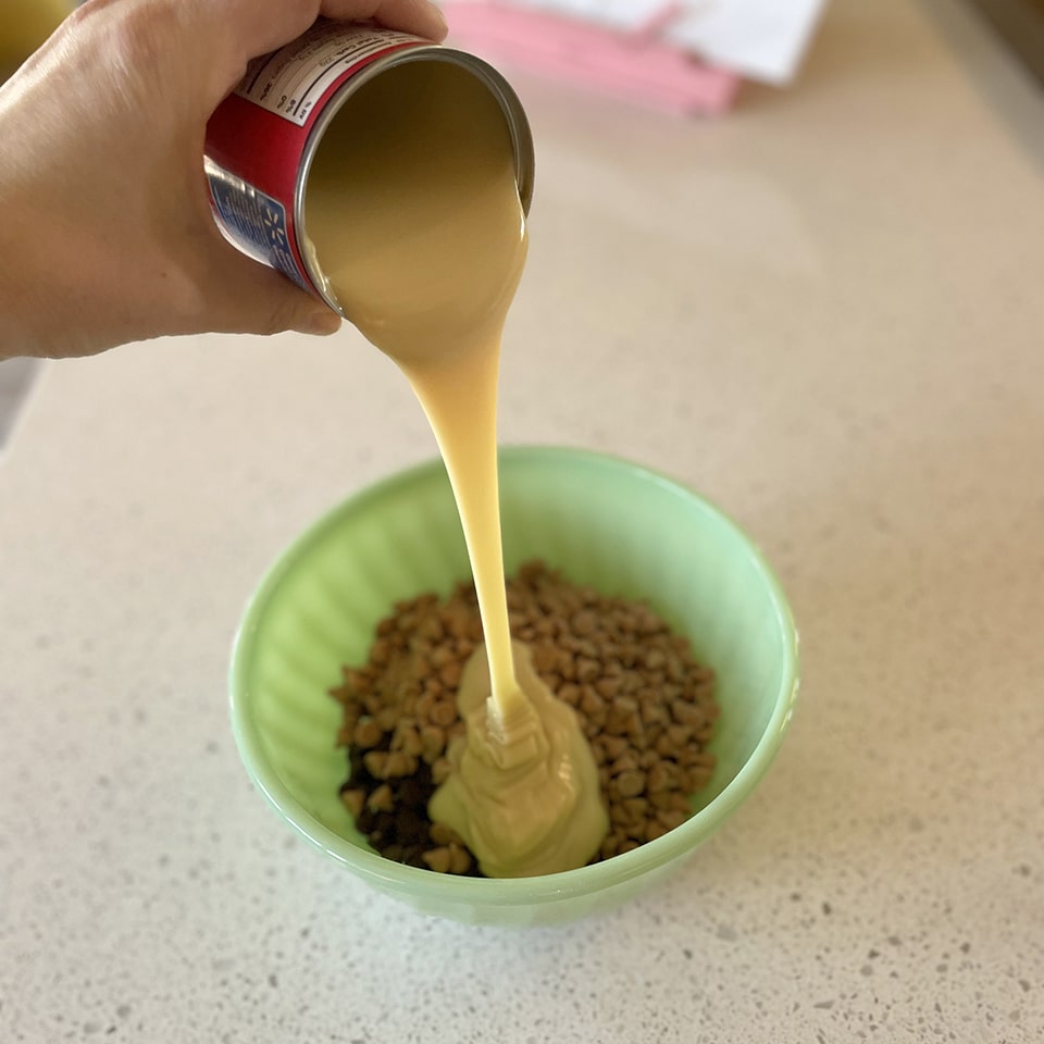 Rocky Road Fudge pouring the milk