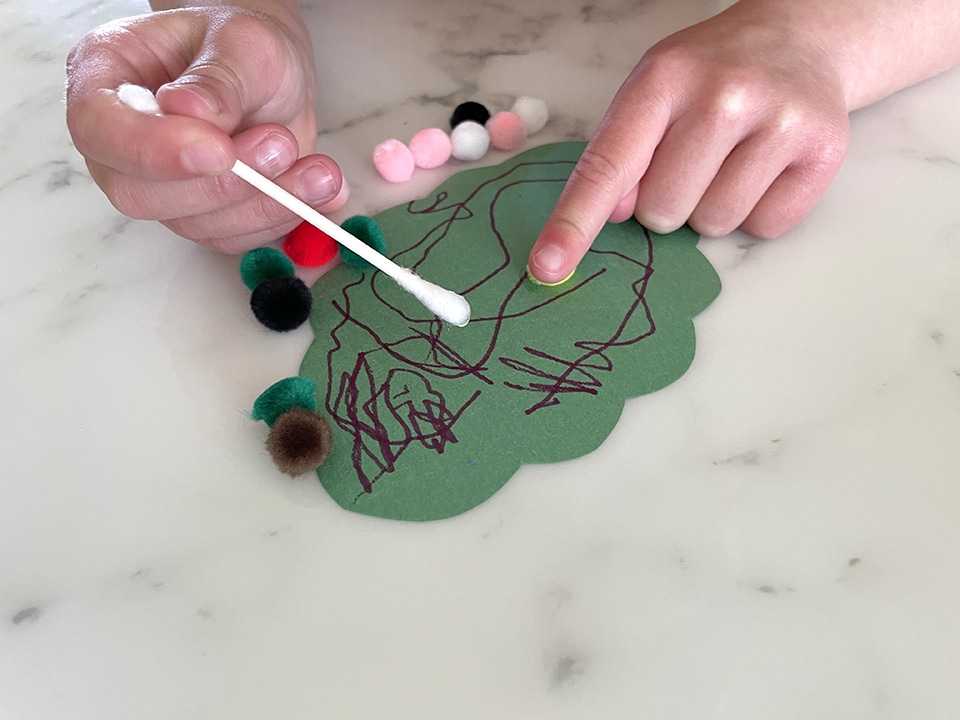 Pom Pom Caterpillars adding the glue