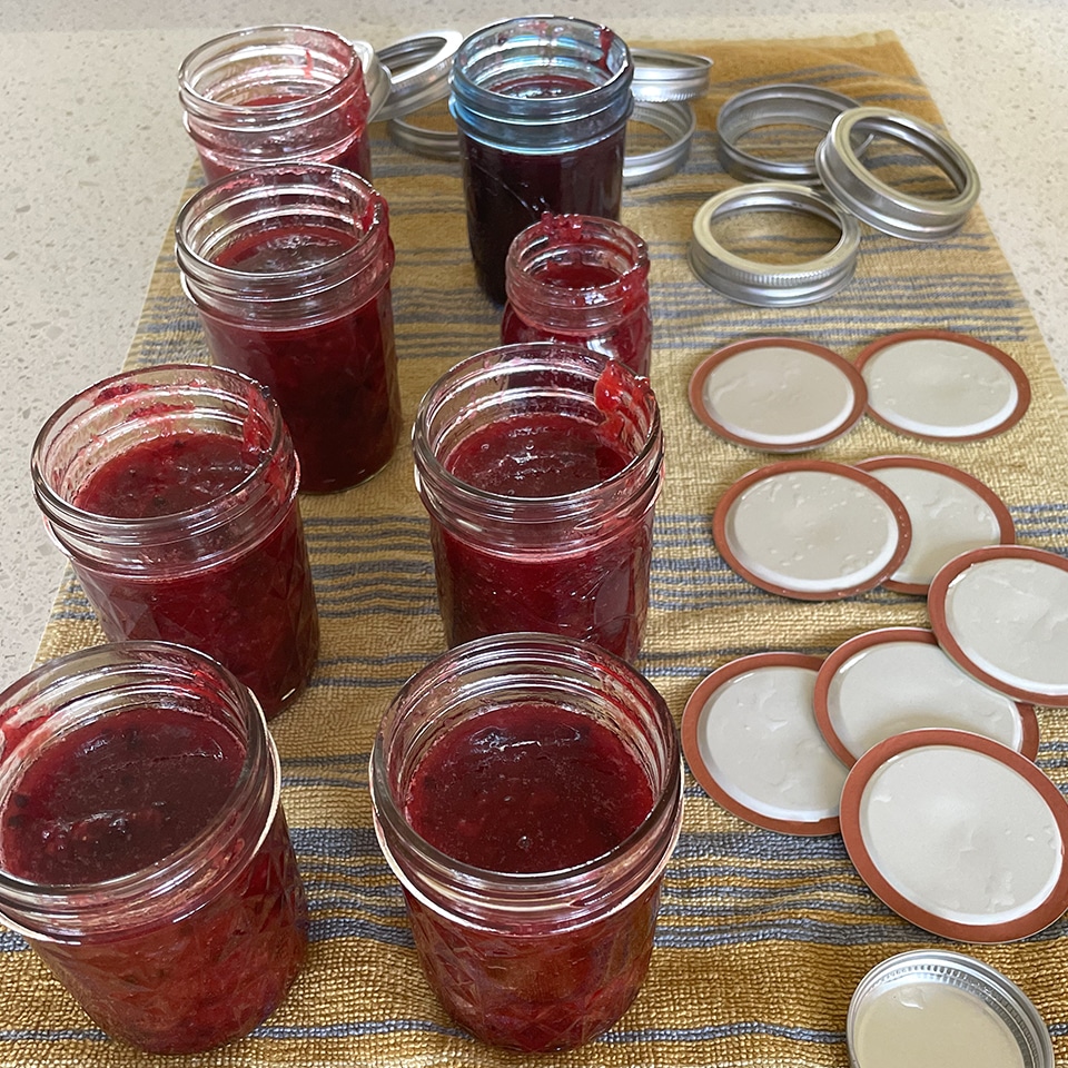 Ladling jam into jars