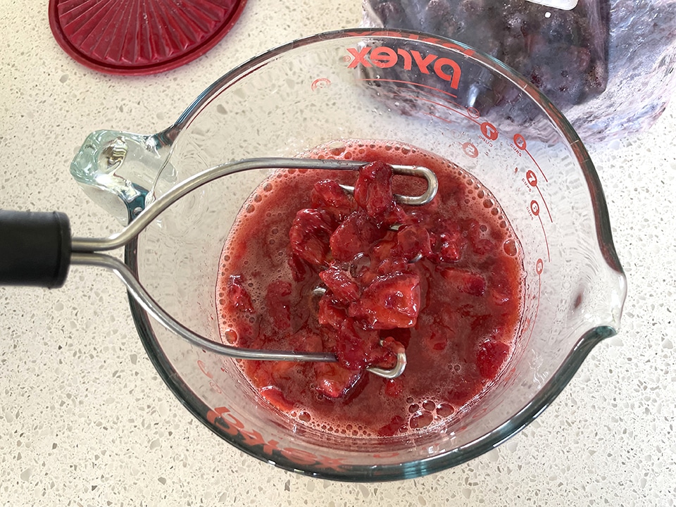 Mashing the strawberries