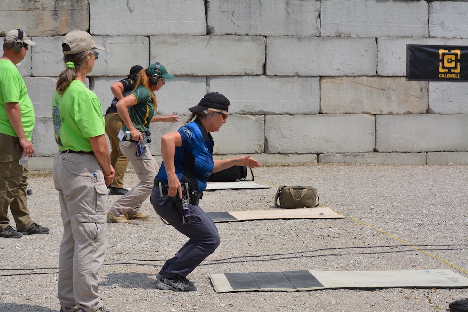 Top Women drop into prone on the Practical Event