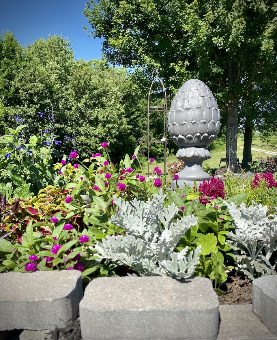 We have a statue to add structure to the center of our spiral garden.