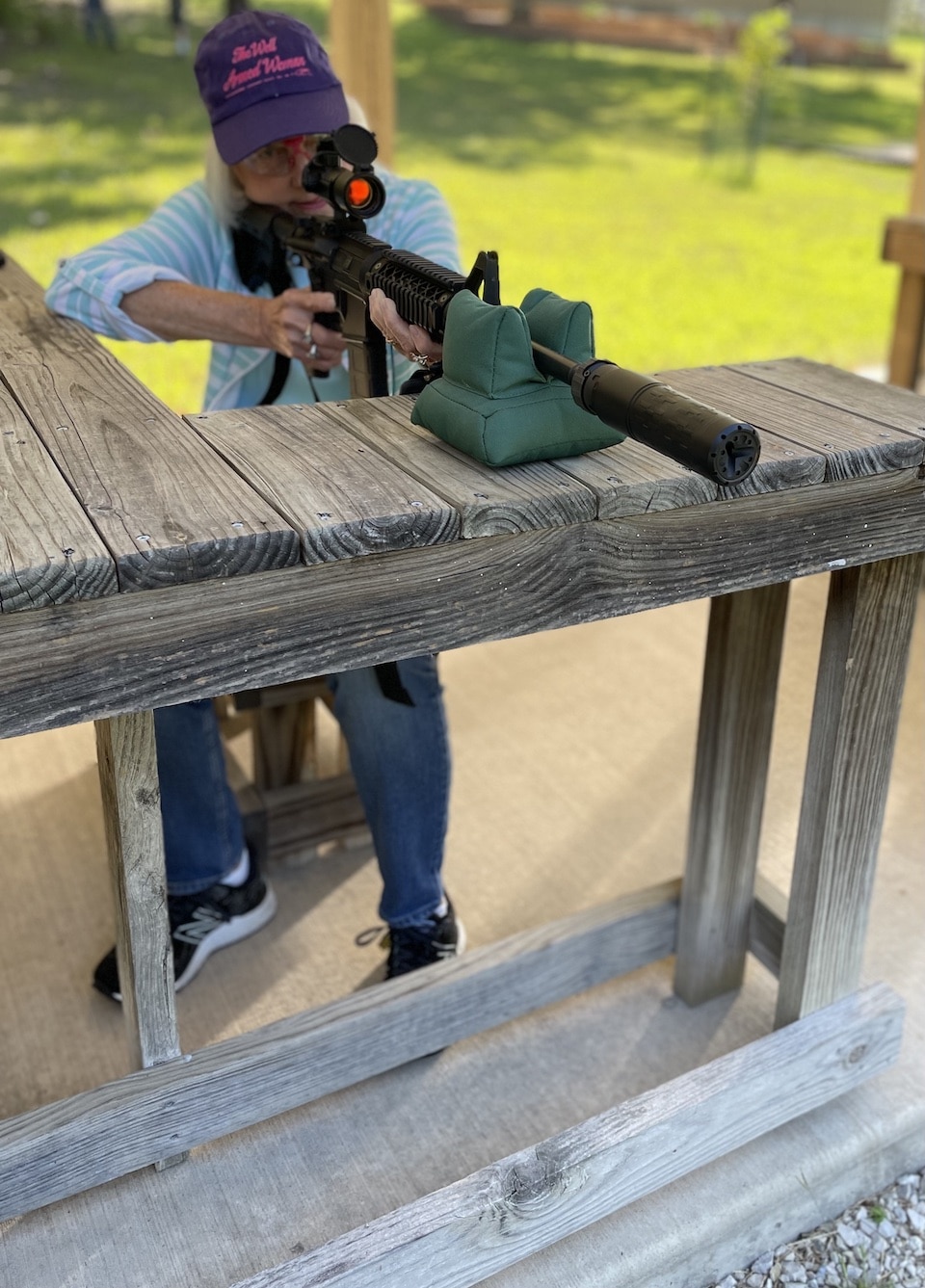 Woman with SilencerCo Silencers AR