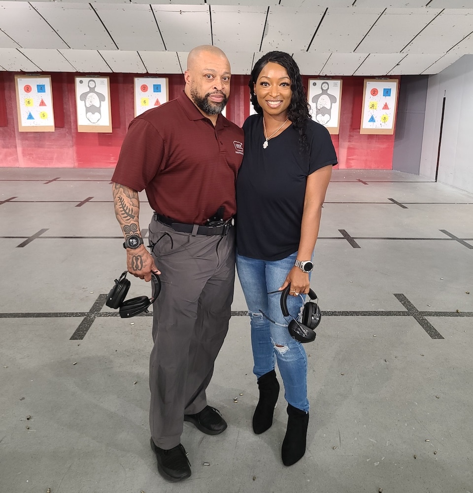 Avery Skipalis with Mr. Scotty Banks, GLOCK Training Manager behind the barrel