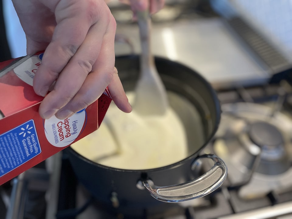 Making white sauce for manicotti