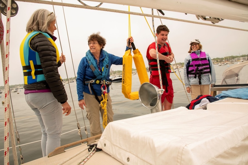 Crew overboard recovery, life-sling usage and other hands-on safety demos all part of the NWSA’s Annual Women’s Sailing Conference (NWSA photo)