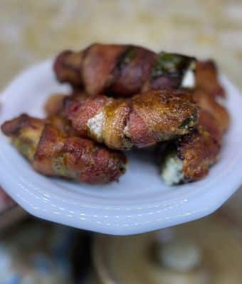 bacon wrapped jalapeno duck poppers on plate