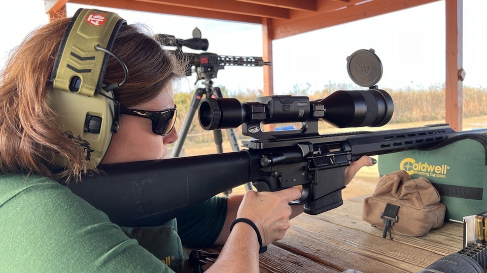 Angie Perry shooting at bench