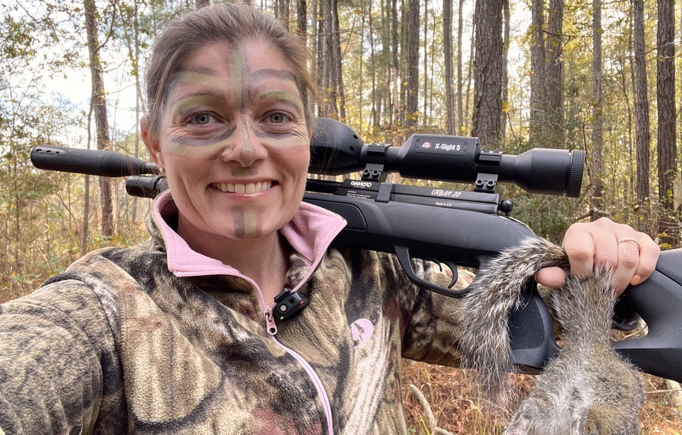 Angie Perry with rifle
