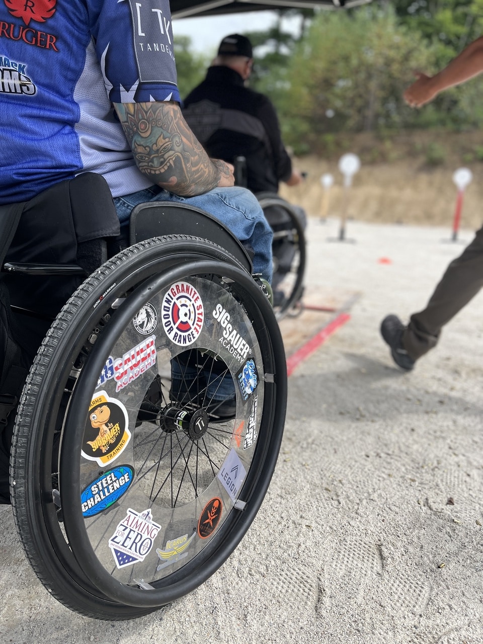 wheelchair wheel Adaptive Defense Shooting Summit