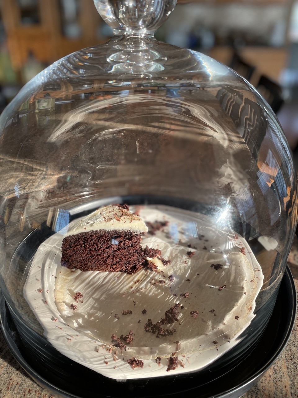Irish stout cake under glass