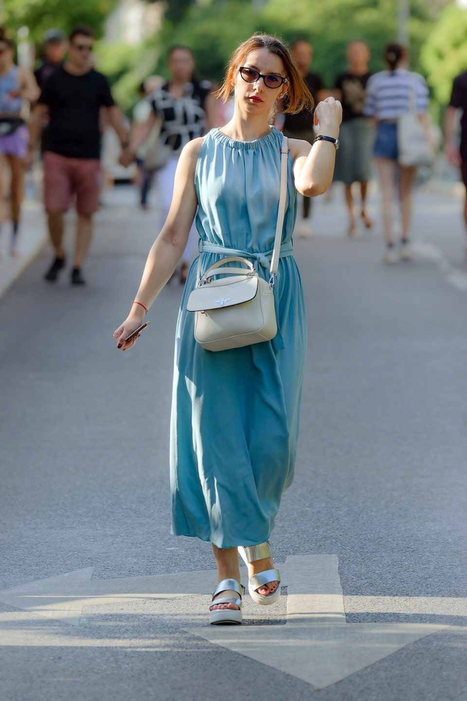 lady walking with purse