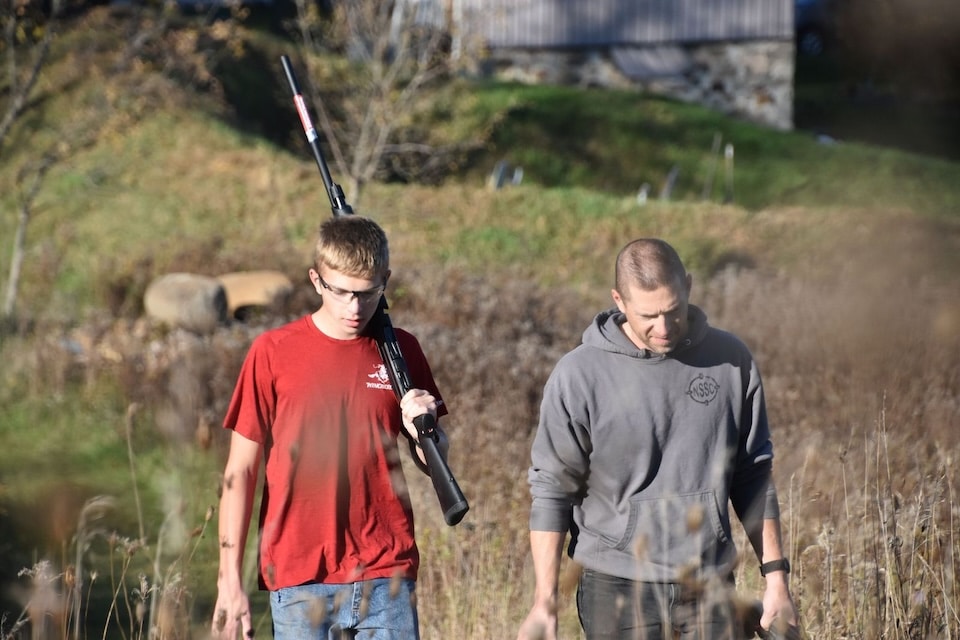 DAd and son talking Introduce Children to Home Defense