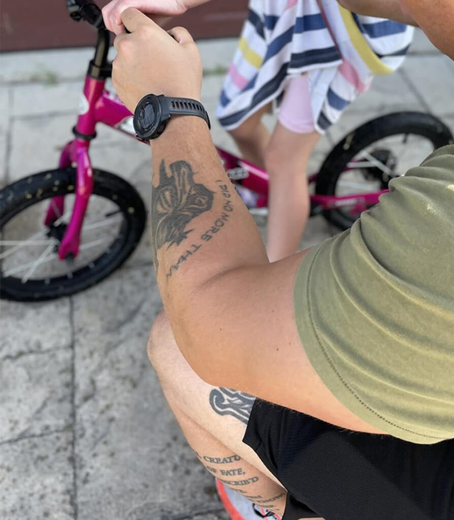 Checking seat height pink Strider Bike
