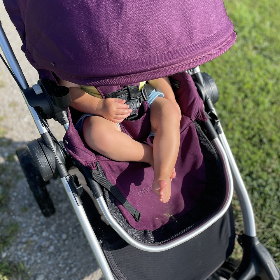 Family walk with bikes and stroller