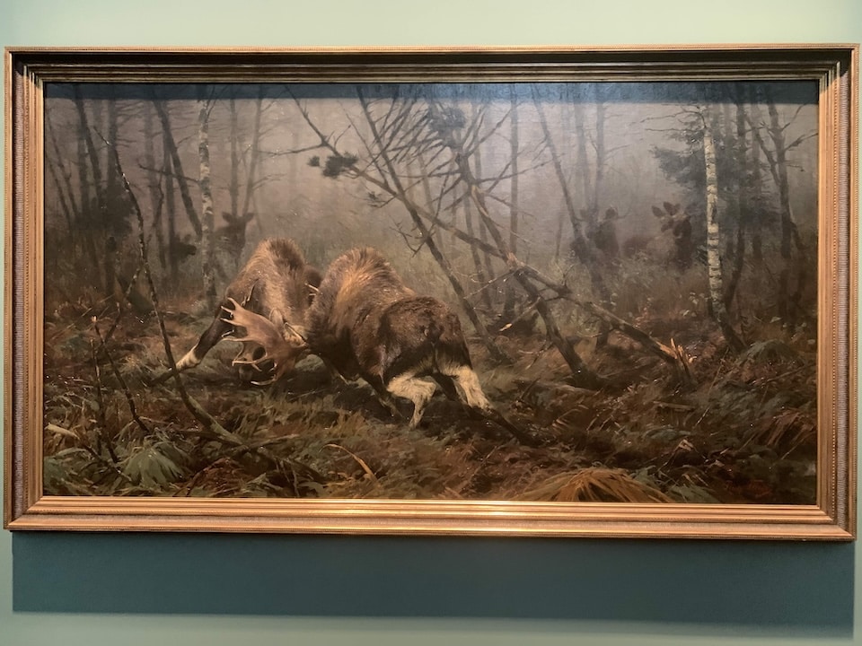 “Fighting Moose,” 1896, Richard Friese. This might be my favorite painting from “Survival of the Fittest.” I love the way the rest of the herd watching the fight is painted, like they’re shadows in the background.