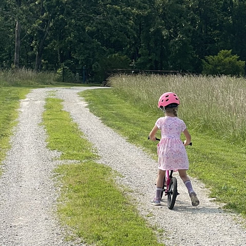 Striding down the driveway