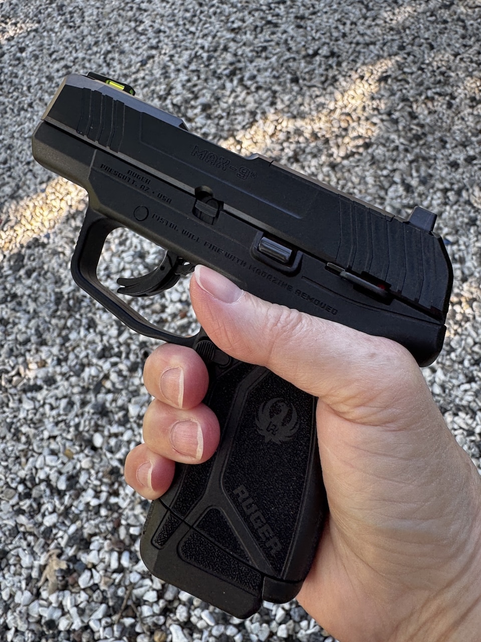 Ruger Max 9 in hand head shots