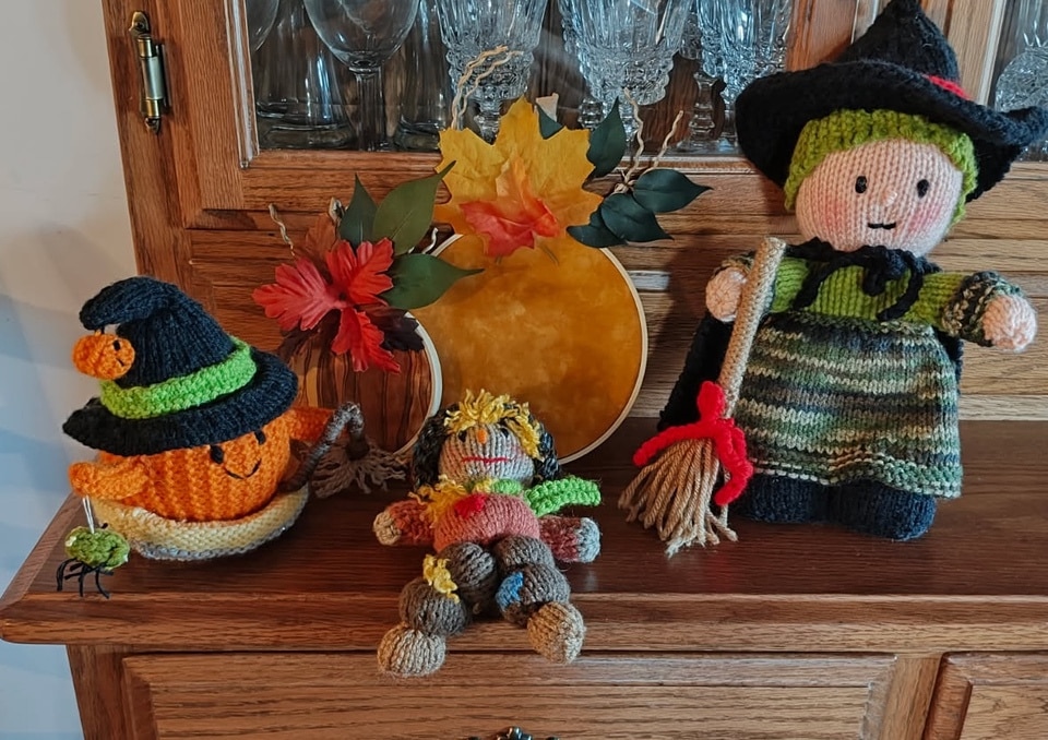 Hoop Pumpkins on china cabinet