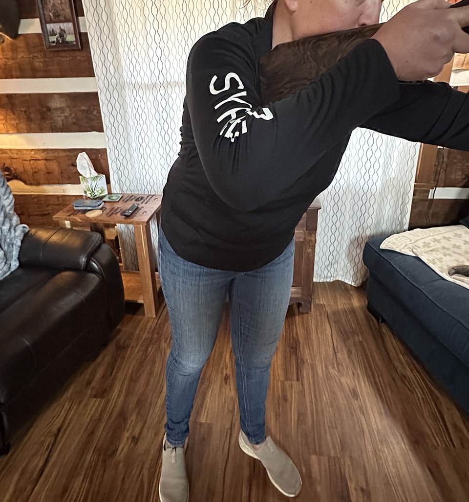 Waist Shooting a Shotgun