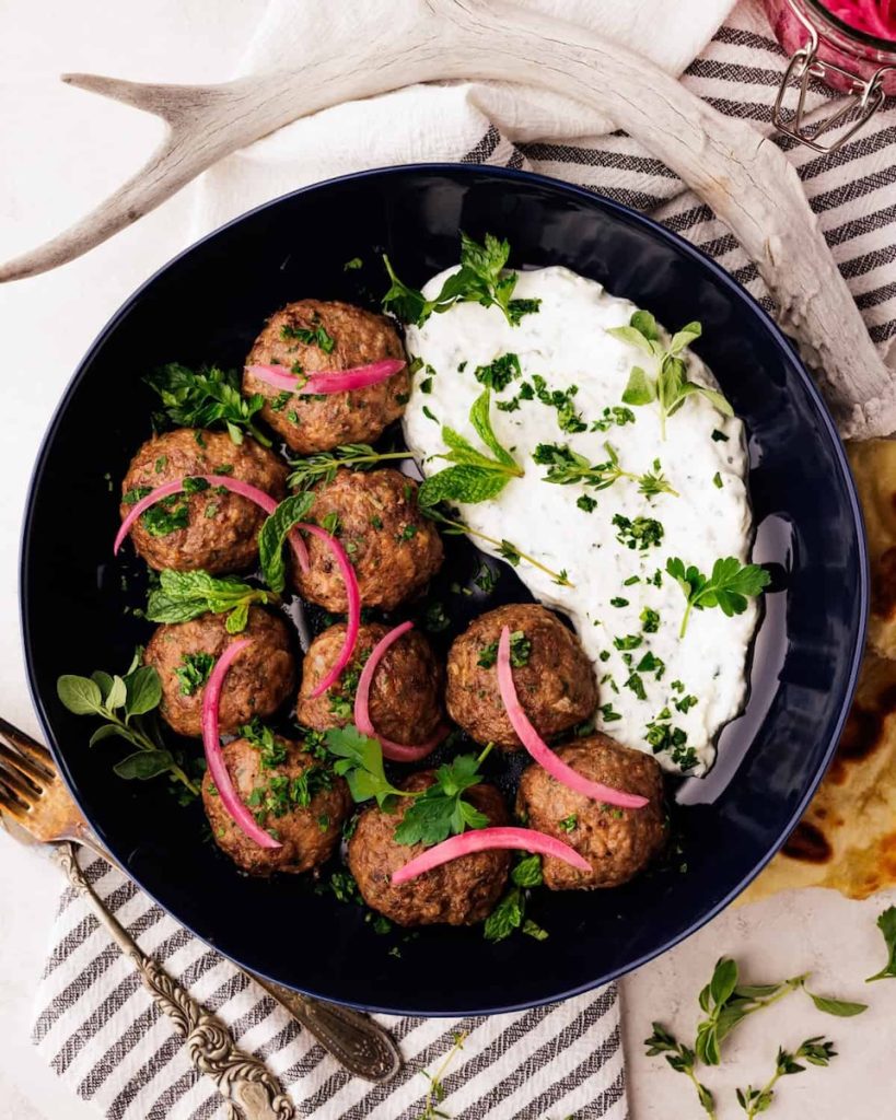 mediterranean-venison-meatballs-in-bowl-with-tzatziki