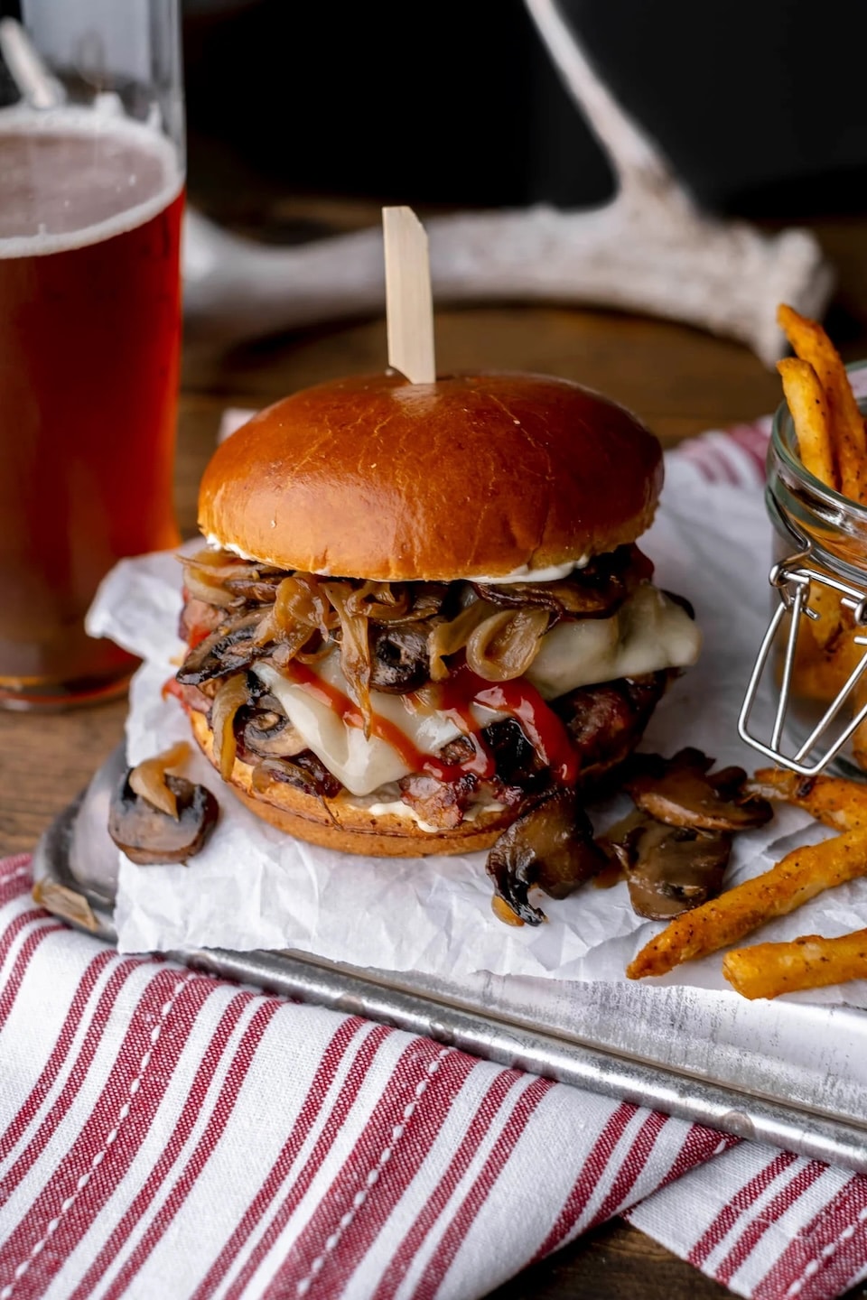 venison-mushroom-swiss-burger-with-beer.jpg