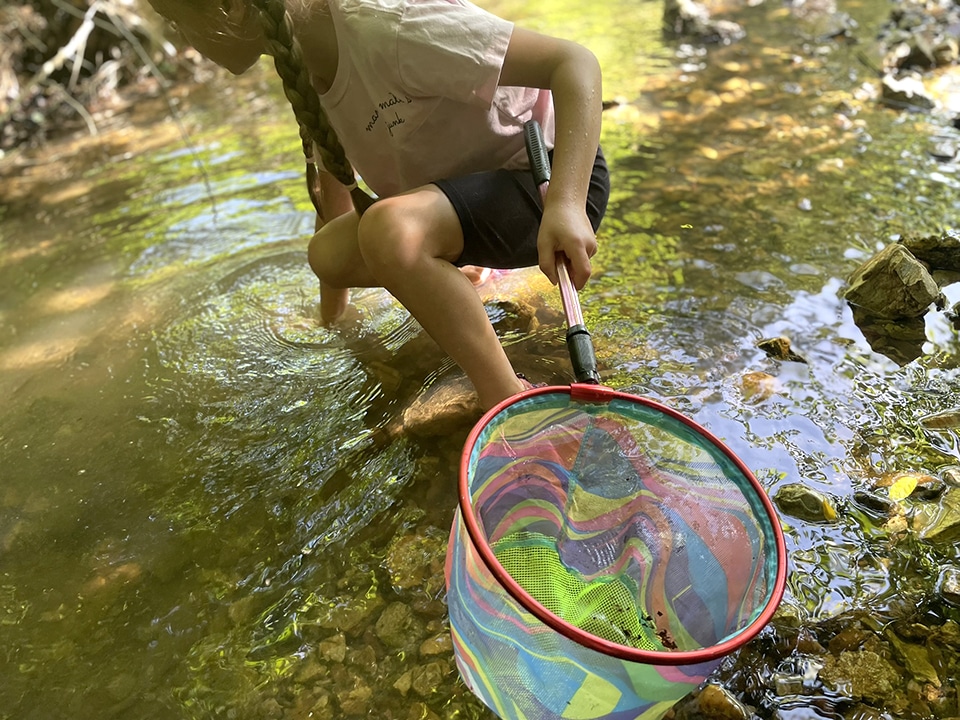 Girl in the creek