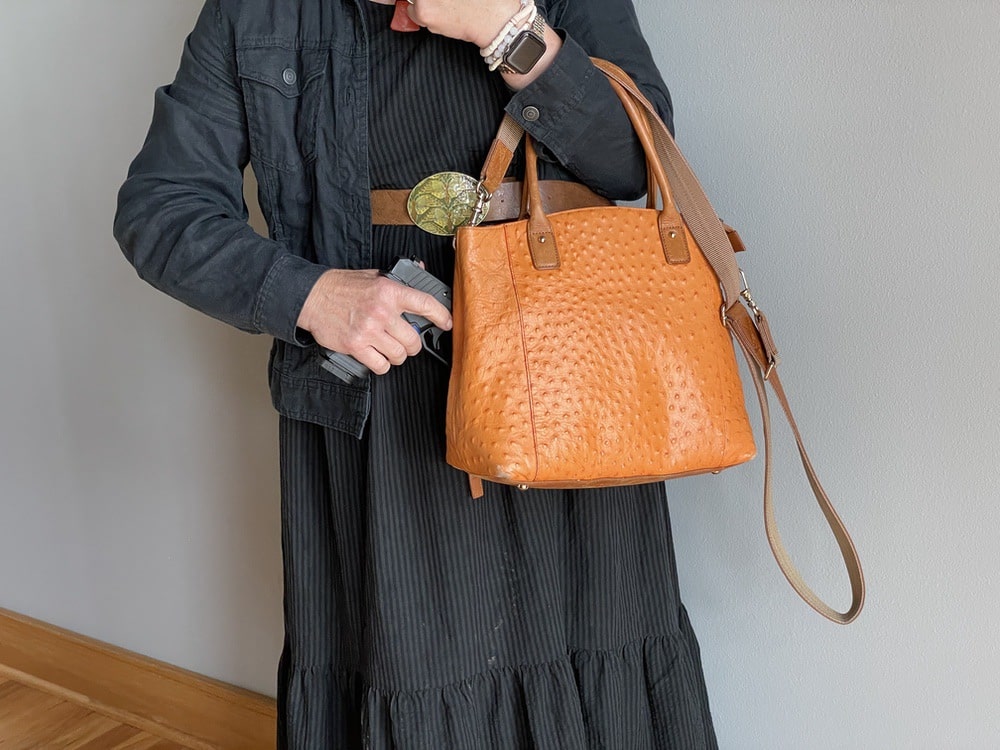Babbs with LNK9 gun and bag